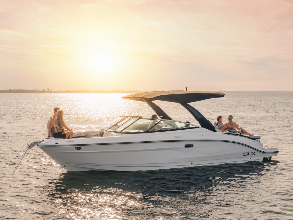2026-SLX-280-SLX280-lifestyle-port-bow-three-quarter-friends-sunset-04995-X3.jpg